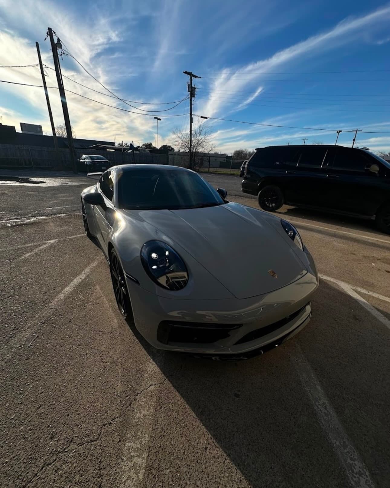 Grey Porsche 911 outside the Richardson shop